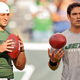 Illustration for article titled Mark Sanchez, Tim Tebow Warm Up By Throwing Ball In Direction Of One Another